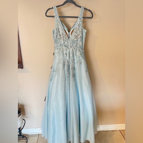 XSCAPE dress, David’s Bridal. Very form fitting around waist, ball gown style. - Picture 4 of 8